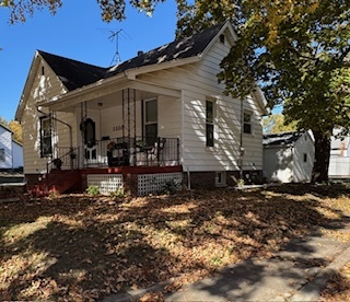 1108 East Main Street Urbana, IL 61802 - Photo 2 of 10 a view of a house with a yard