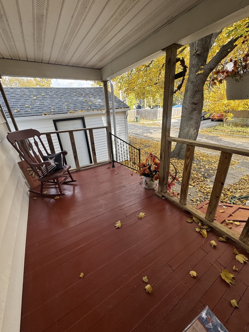 1108 East Main Street Urbana, IL 61802 - Photo 9 of 10 a view of a living room and floor to ceiling window