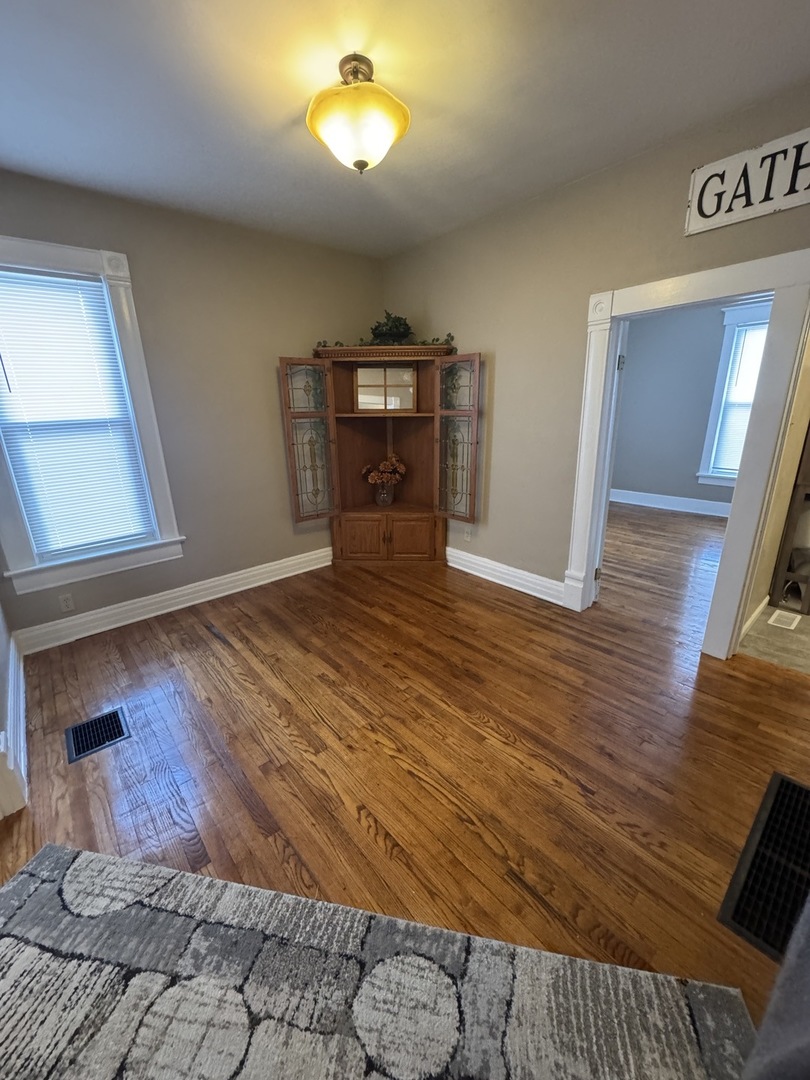 1108 East Main Street Urbana, IL 61802 - Photo 10 of 10 a view of a livingroom with wooden floor