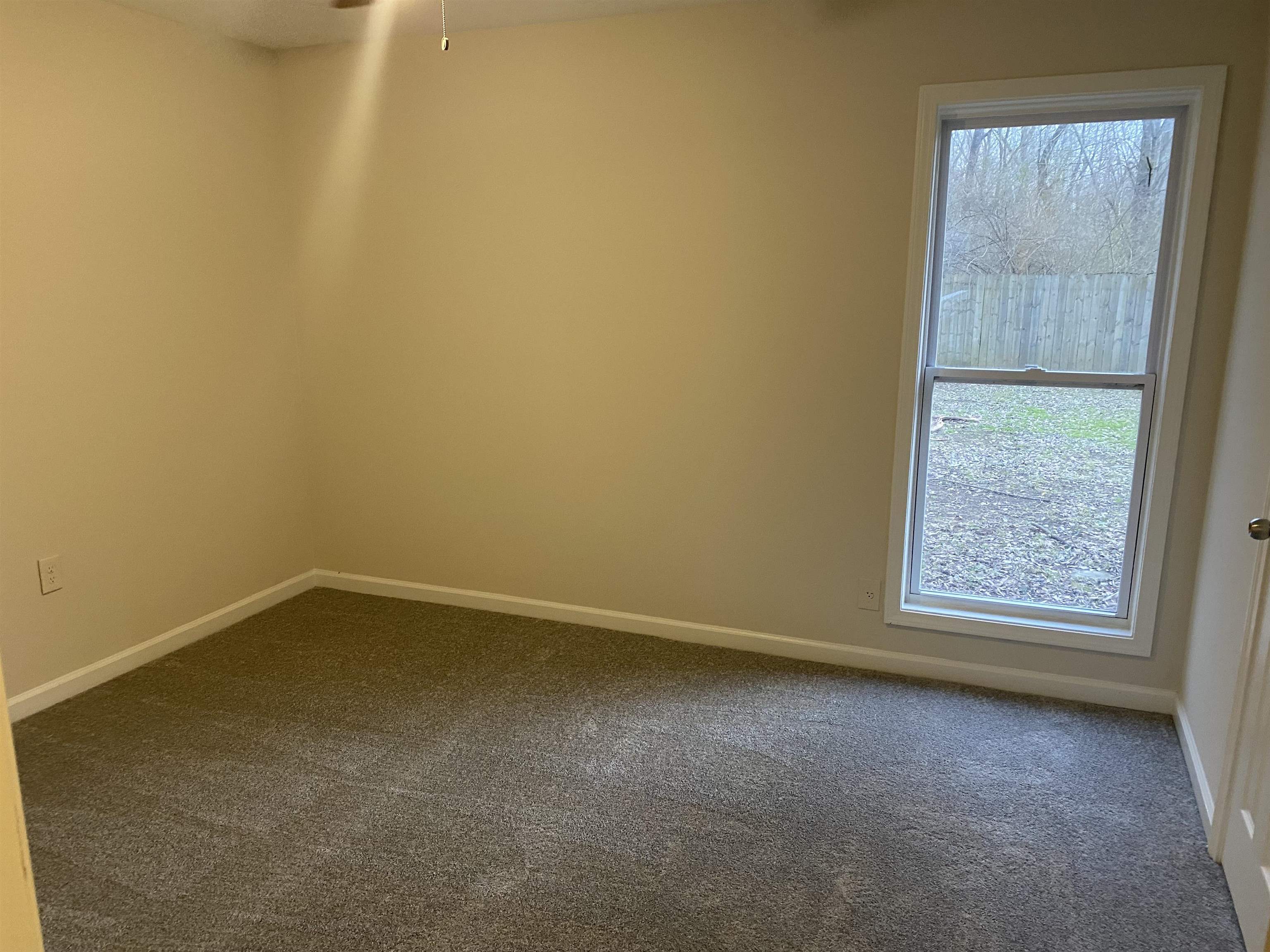 777 Archie Drive Memphis, TN 38127 - Photo 9 of 15 a view of an empty room with a window