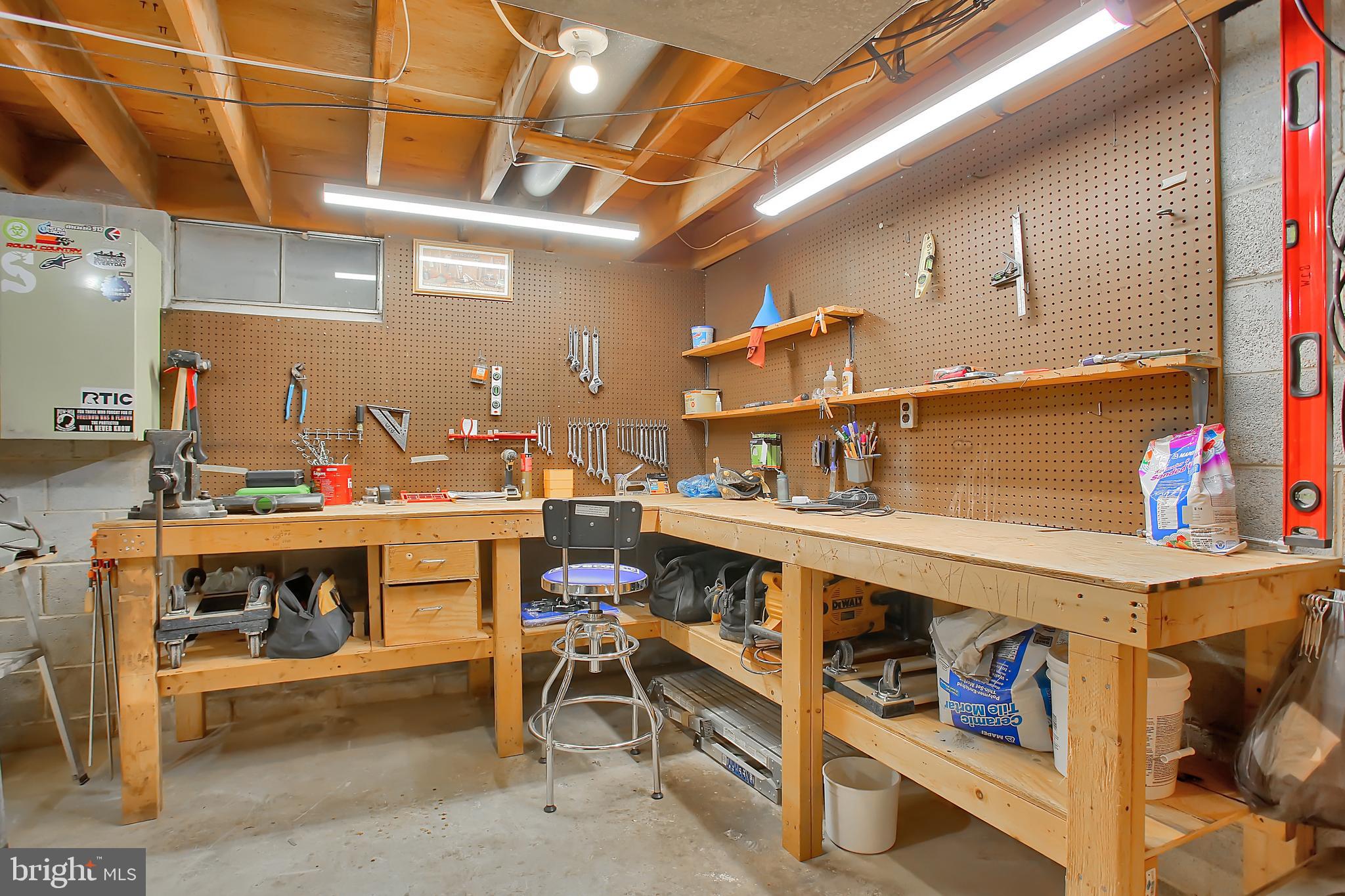 1887 Marigold Road York, PA 17408 - Photo 22 of 37 Workshop with built in benches
