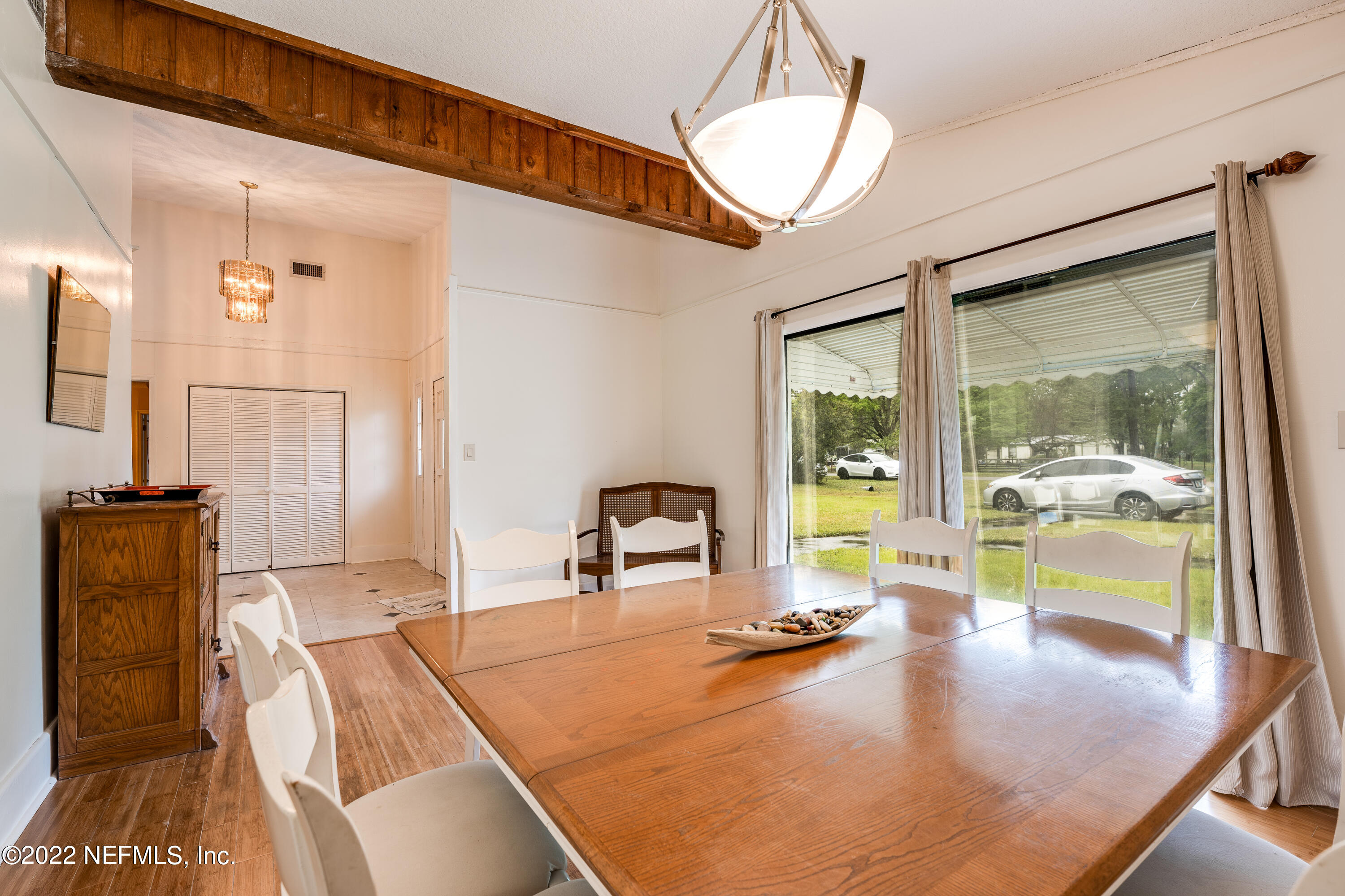 54528 Vikki Road Callahan, FL 32011 - Photo 12 of 41 a living room with dining table
