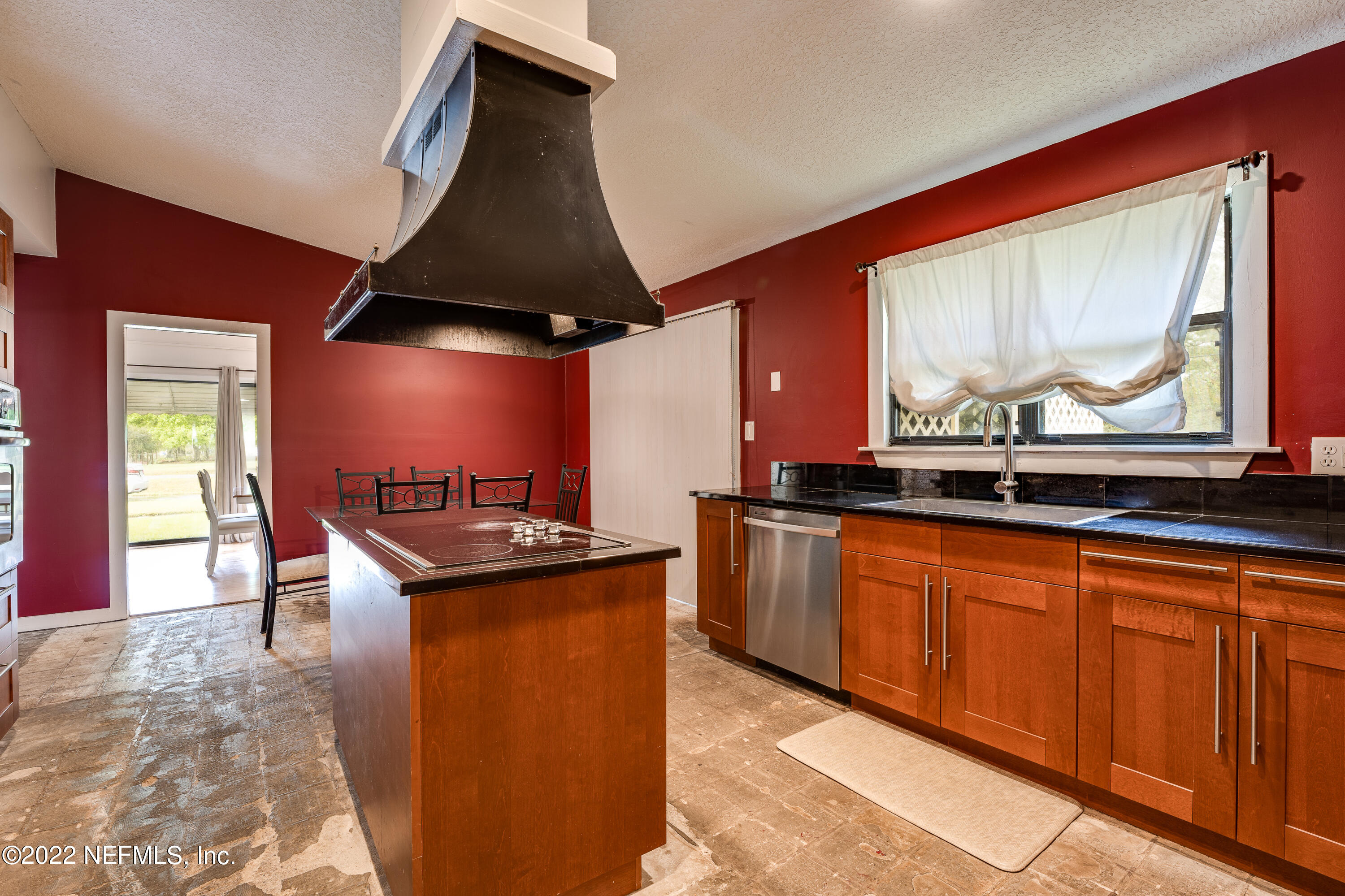 54528 Vikki Road Callahan, FL 32011 - Photo 17 of 41 a kitchen with stainless steel appliances a sink and a microwave