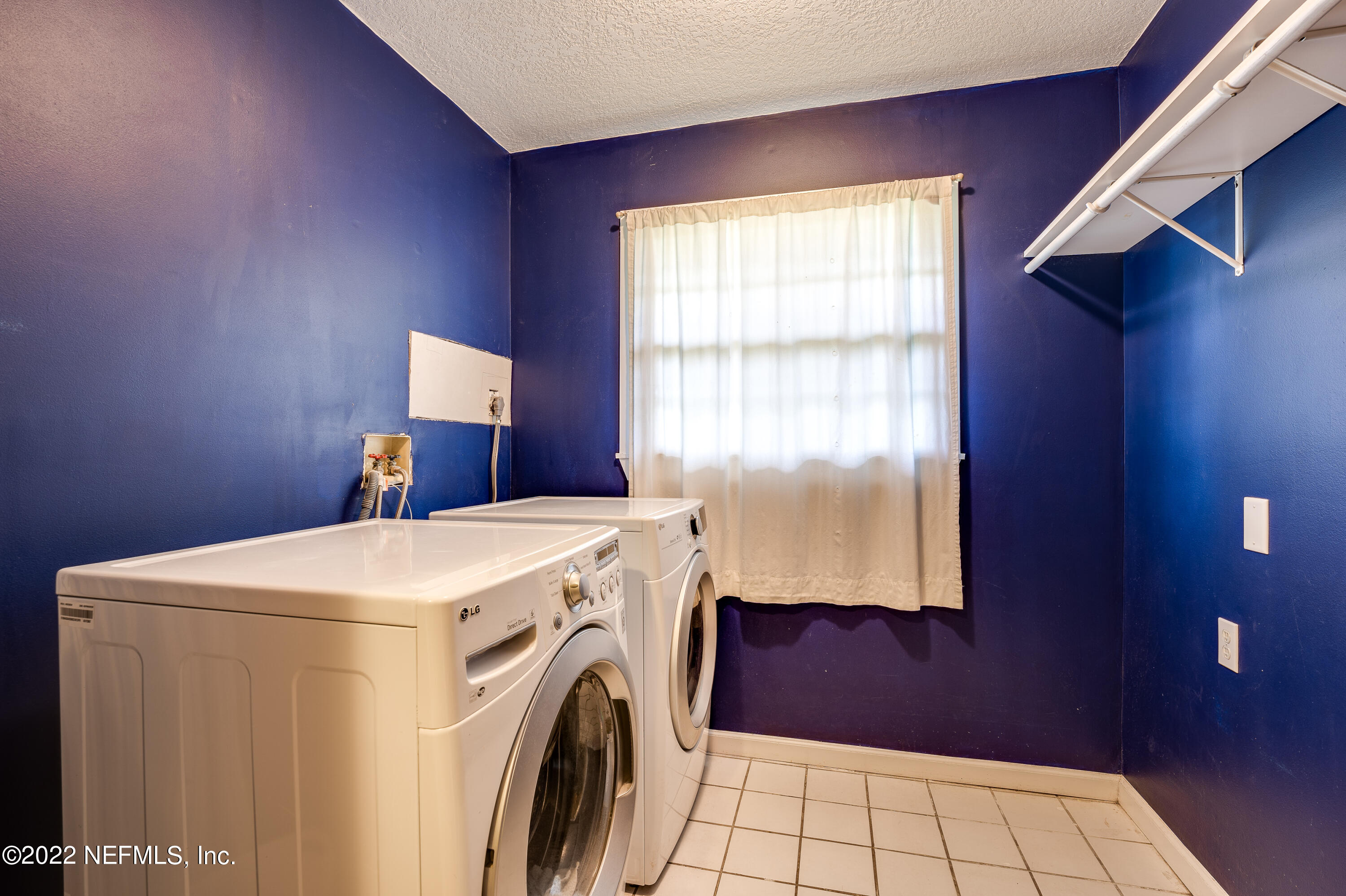 54528 Vikki Road Callahan, FL 32011 - Photo 21 of 41 a utility room with dryer and washer