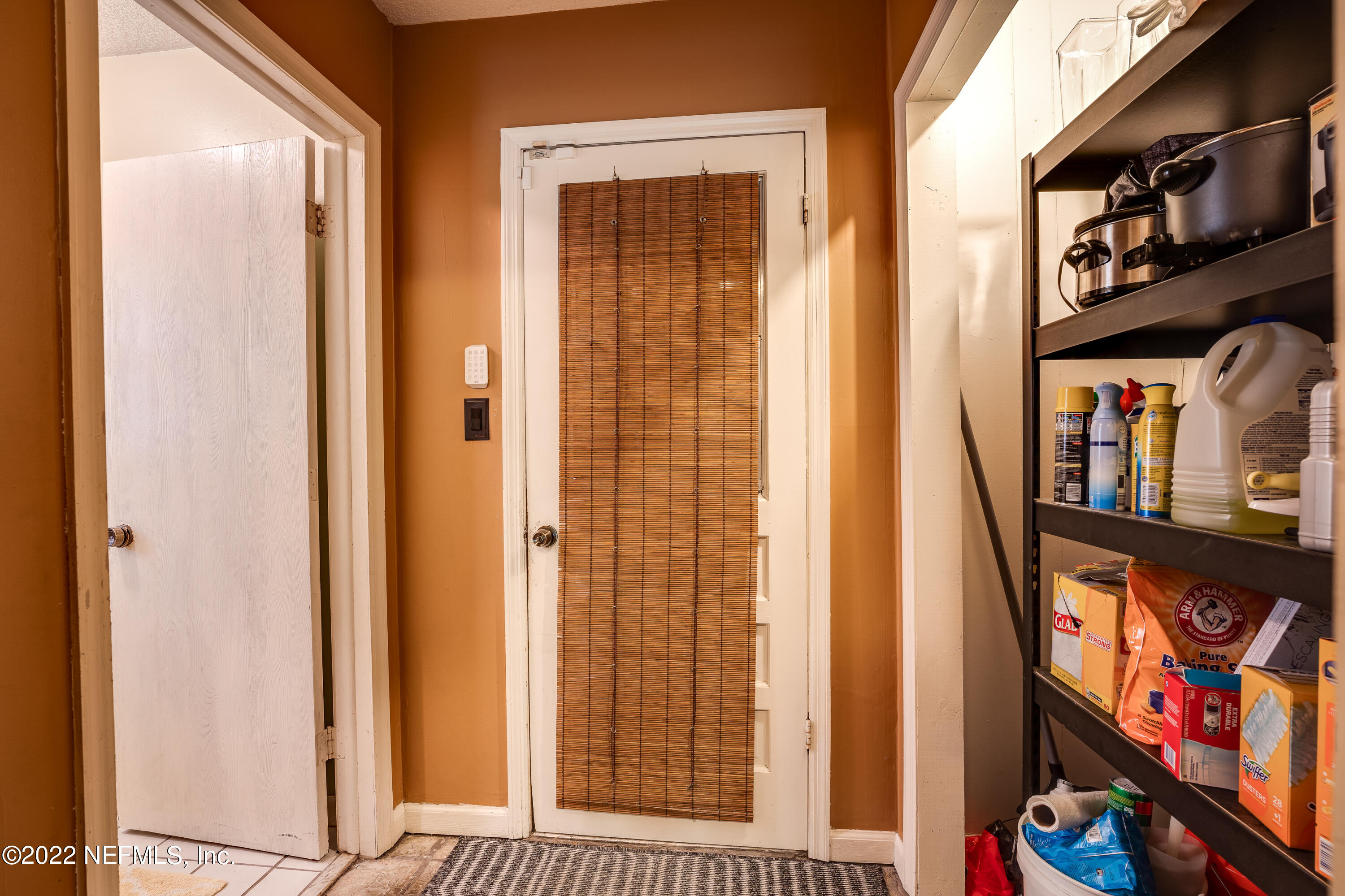 54528 Vikki Road Callahan, FL 32011 - Photo 22 of 41 a view of front door with cabinets