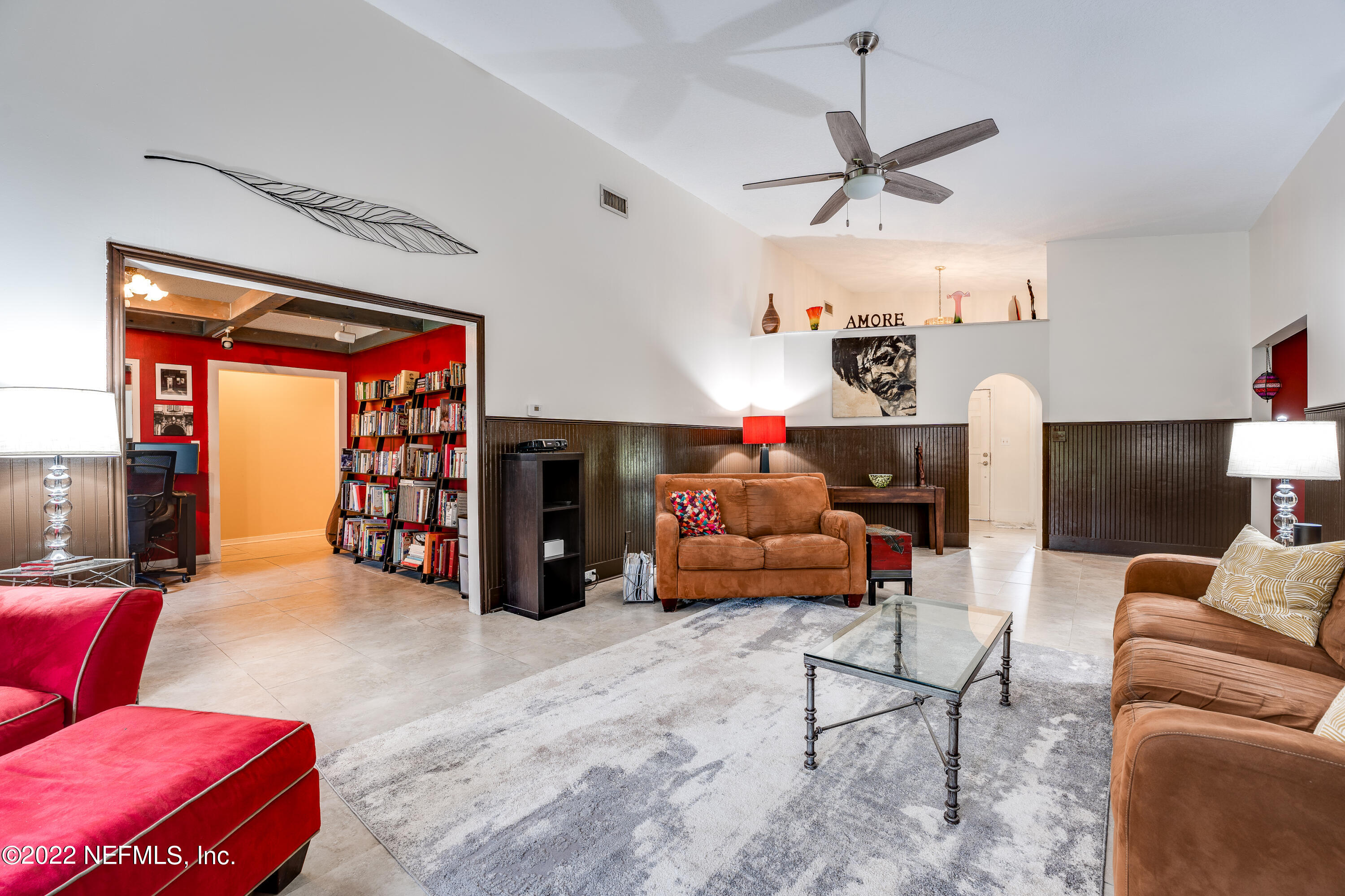 54528 Vikki Road Callahan, FL 32011 - Photo 27 of 41 a living room with furniture gym equipment and a window