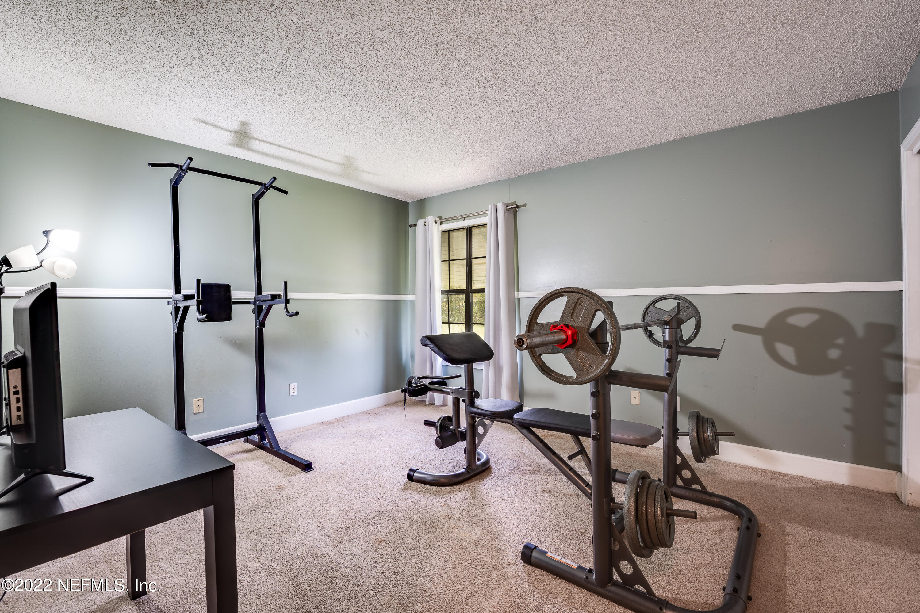 54528 Vikki Road Callahan, FL 32011 - Photo 36 of 41 a view of a room with gym equipment