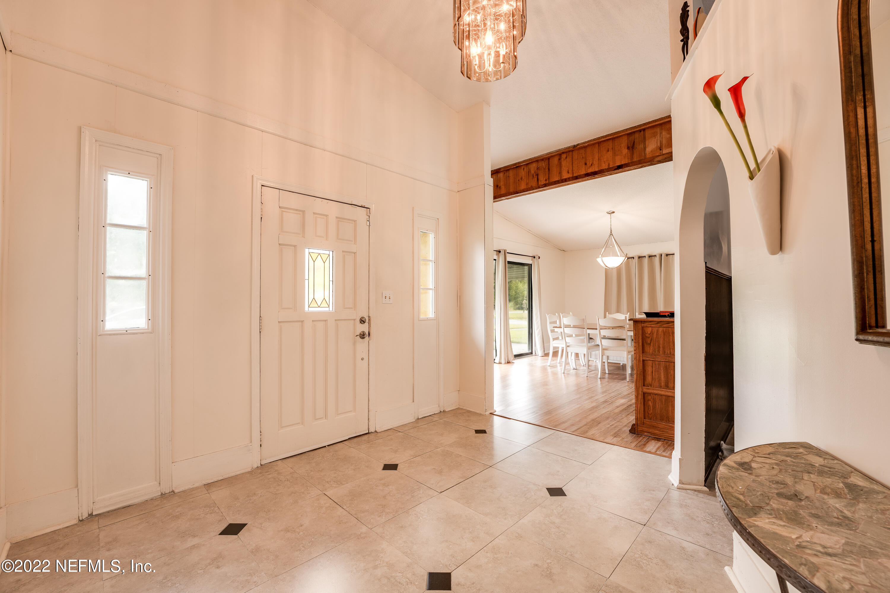 54528 Vikki Road Callahan, FL 32011 - Photo 8 of 41 a view of livingroom with hardwood floor and a ceiling fan