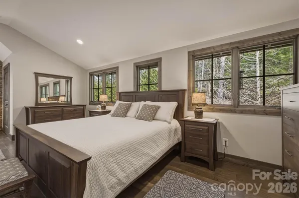 a kitchen with granite countertop a refrigerator and a stove