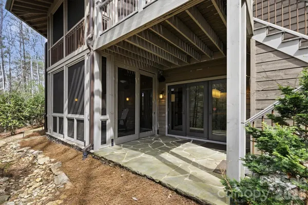 a view of house with outdoor space and sitting area