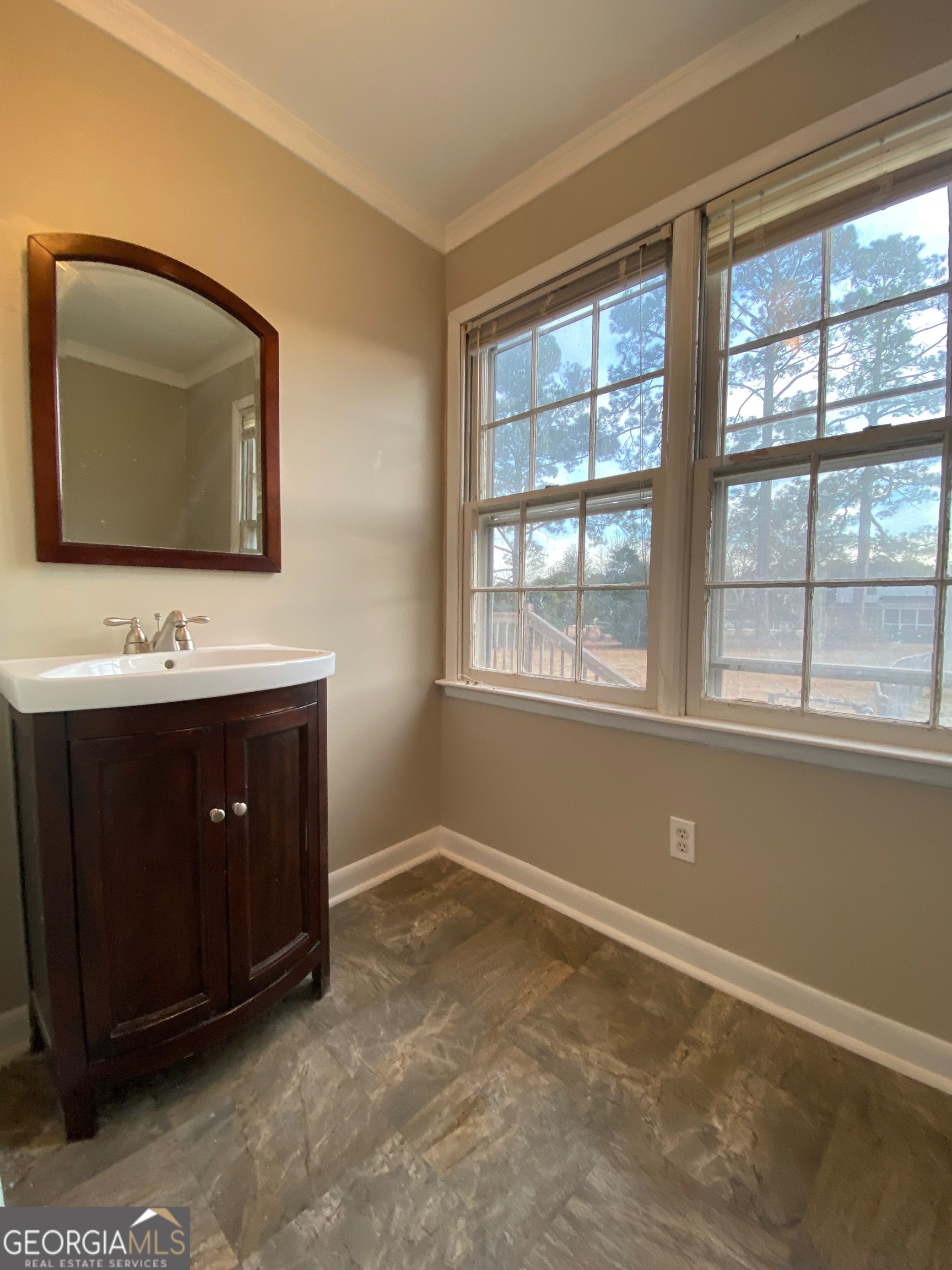 117 Laura Lane Fort Valley, GA 31030 - Photo 11 of 28 a bathroom with a sink vanity and a mirror