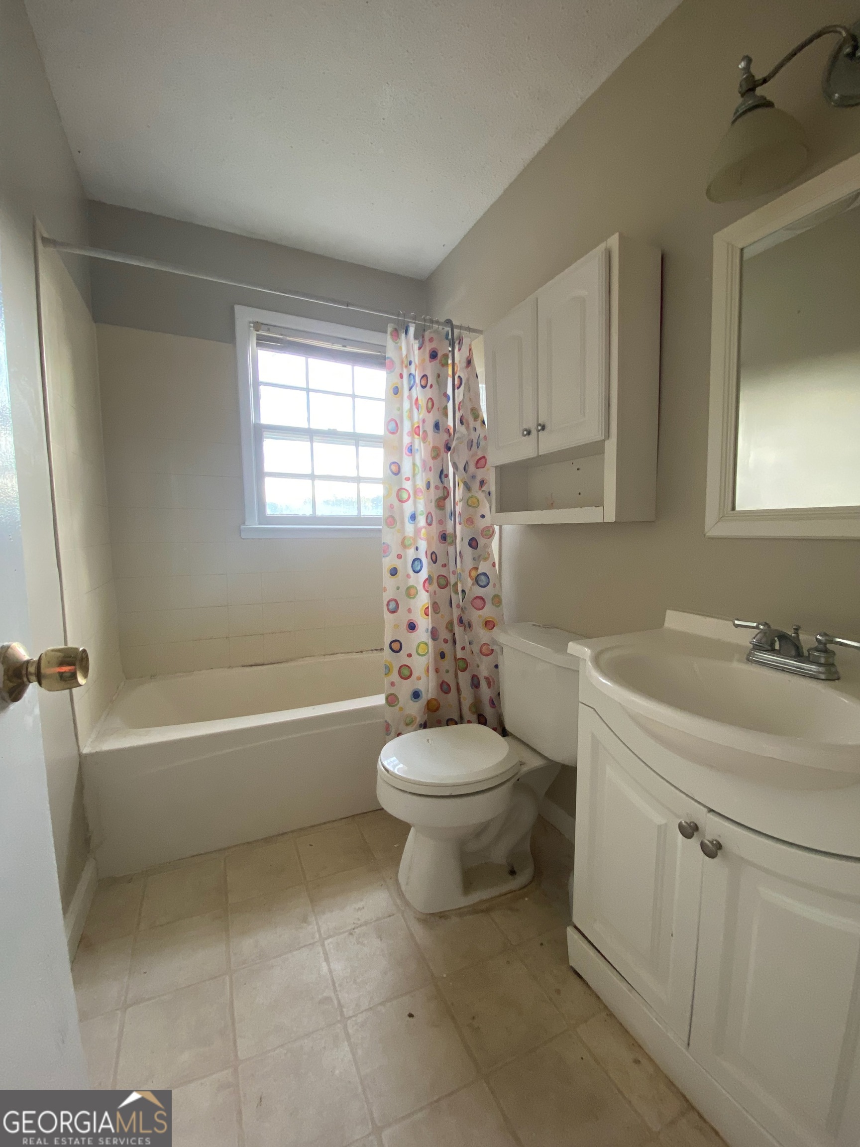 117 Laura Lane Fort Valley, GA 31030 - Photo 19 of 28 a bathroom with a sink a toilet and shower