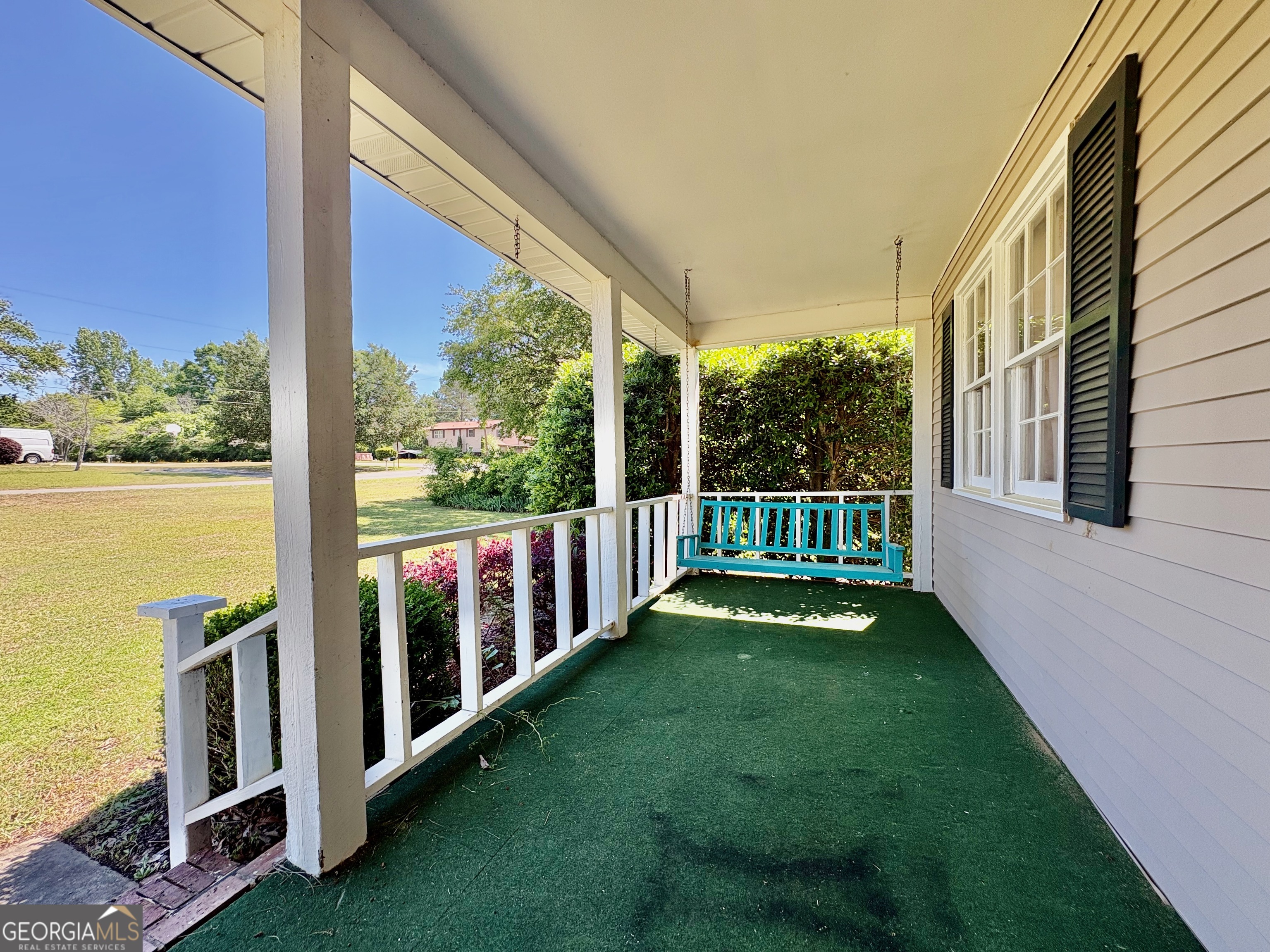 117 Laura Lane Fort Valley, GA 31030 - Photo 2 of 28 a view of a porch with a yard chairs and a yard
