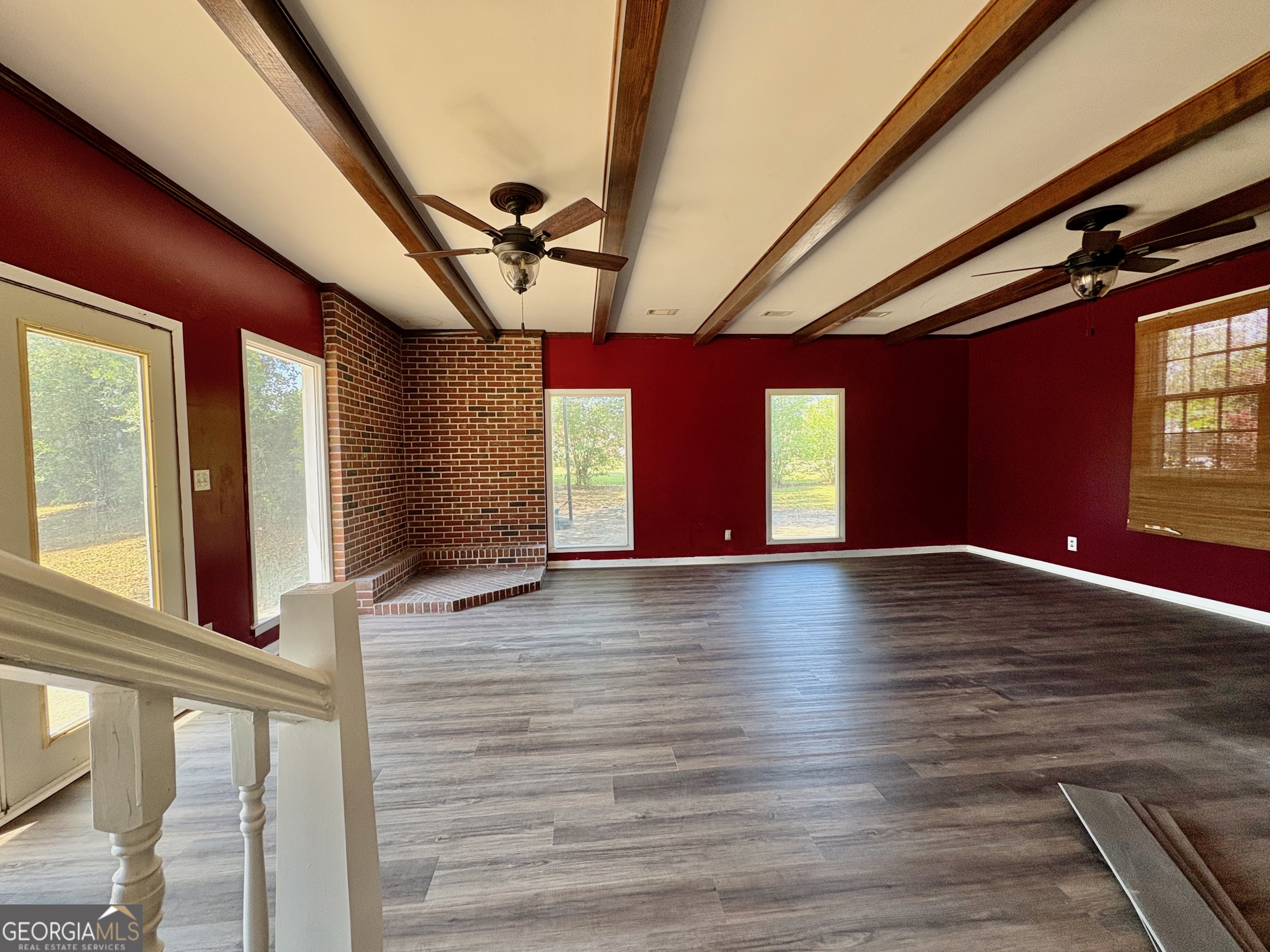 117 Laura Lane Fort Valley, GA 31030 - Photo 5 of 28 a view of empty room with windows and ceiling fan