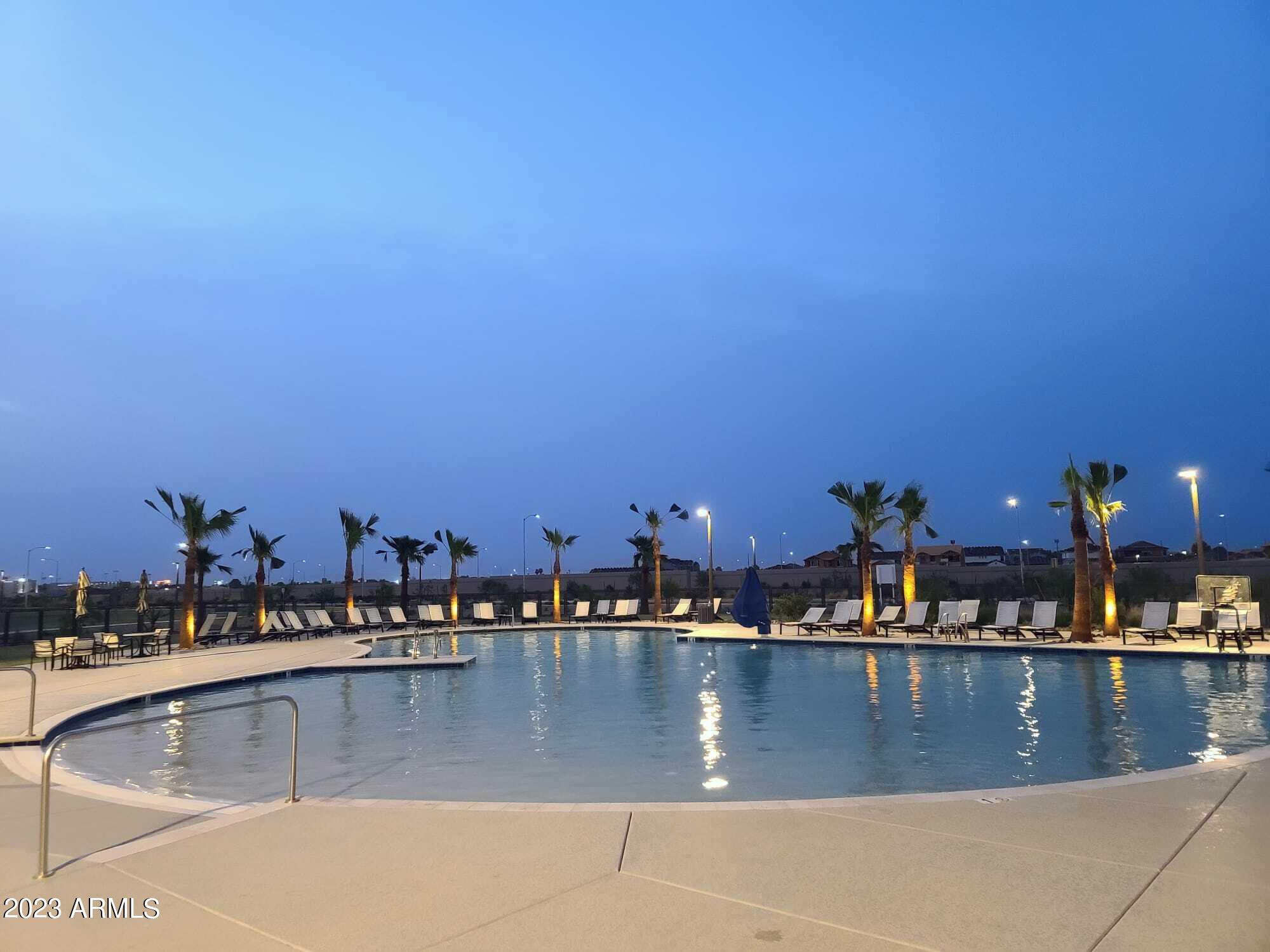 9013 West Marshall Avenue Glendale, AZ 85305 - Photo 13 of 22 a view of swimming pool with outdoor seating
