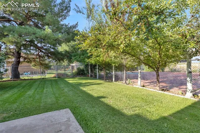 a view of a backyard with a garden