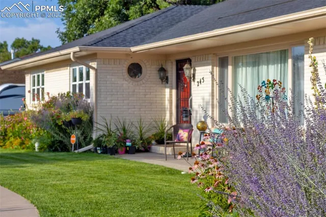 a front view of house with yard