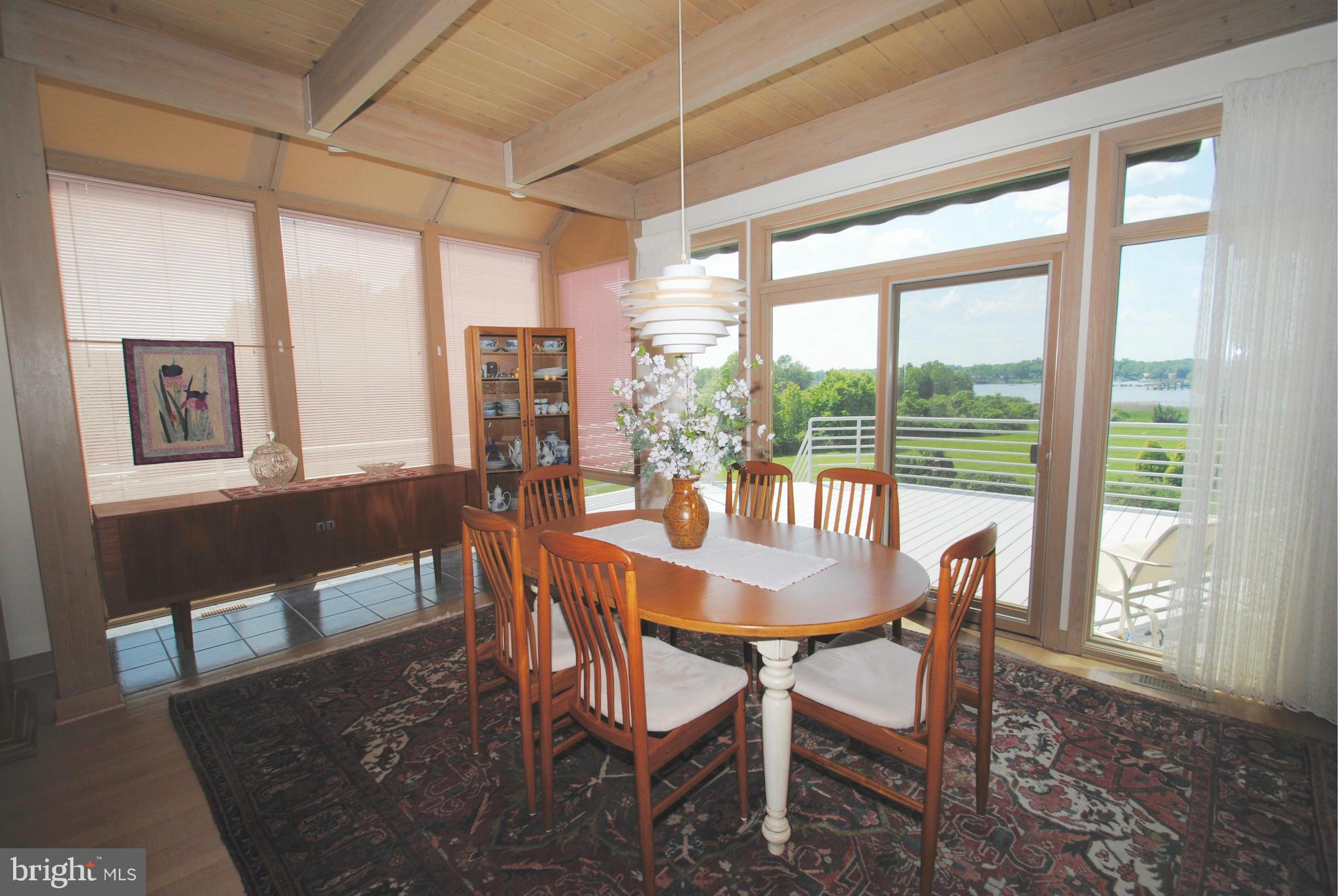 3410 Hidden River View Road Annapolis, MD 21403 - Photo 8 of 30 Breakfast nook leads to large deck