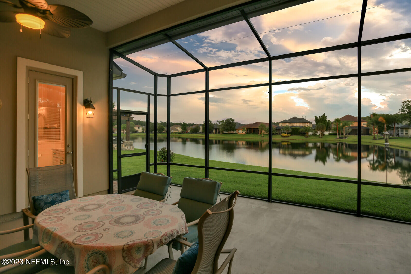 291 Ellsworth Circle St. Johns, FL 32259 - Photo 2 of 72 a view of a porch with furniture and floor to ceiling window