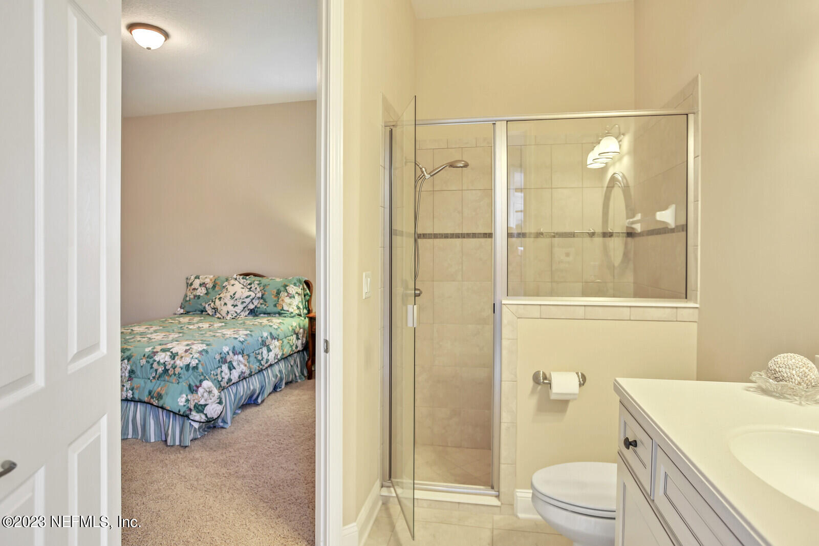 291 Ellsworth Circle St. Johns, FL 32259 - Photo 28 of 72 a bathroom with a granite countertop sink mirror vanity and toilet