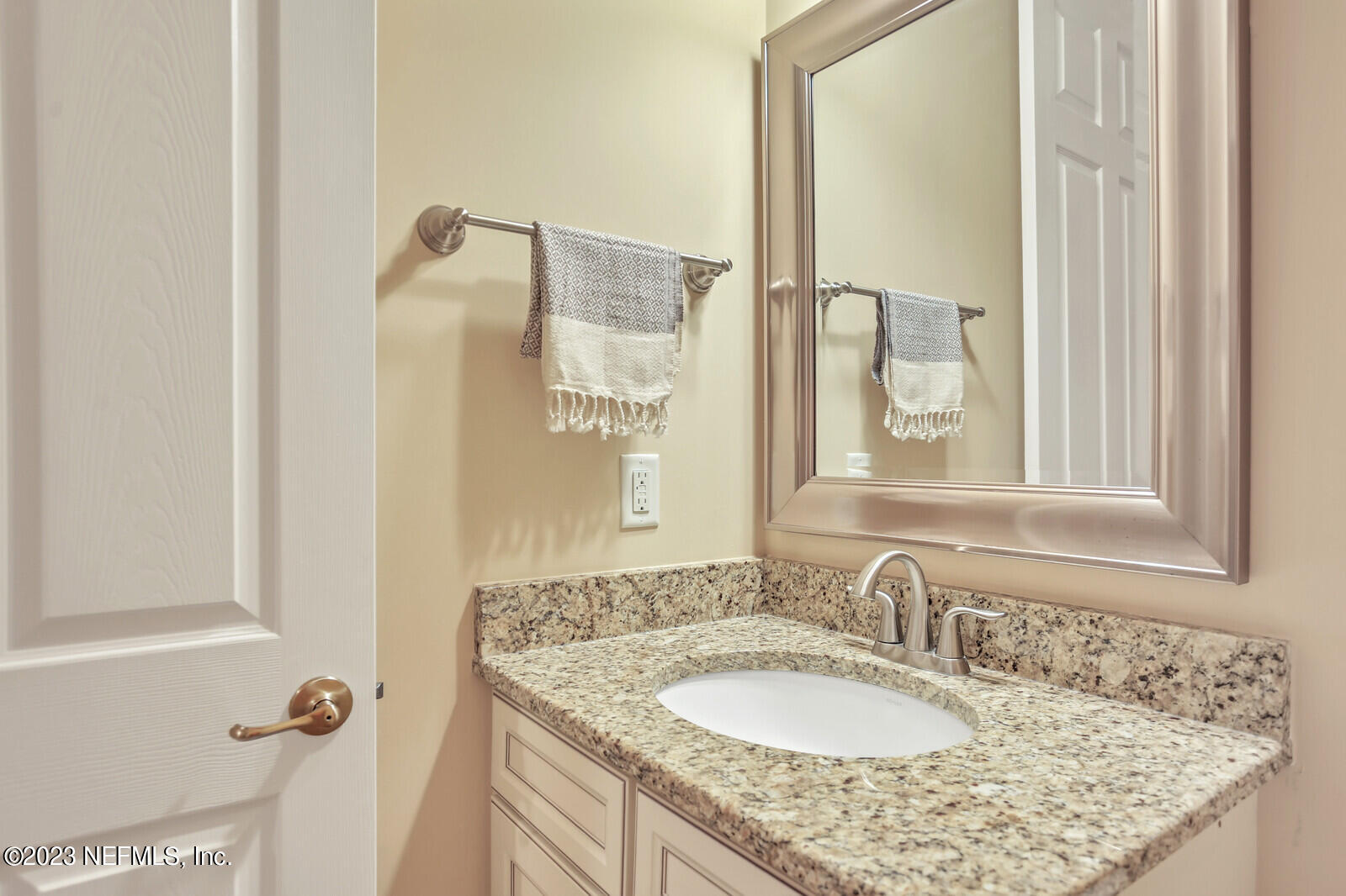 291 Ellsworth Circle St. Johns, FL 32259 - Photo 31 of 72 a bathroom with a granite countertop sink and a mirror
