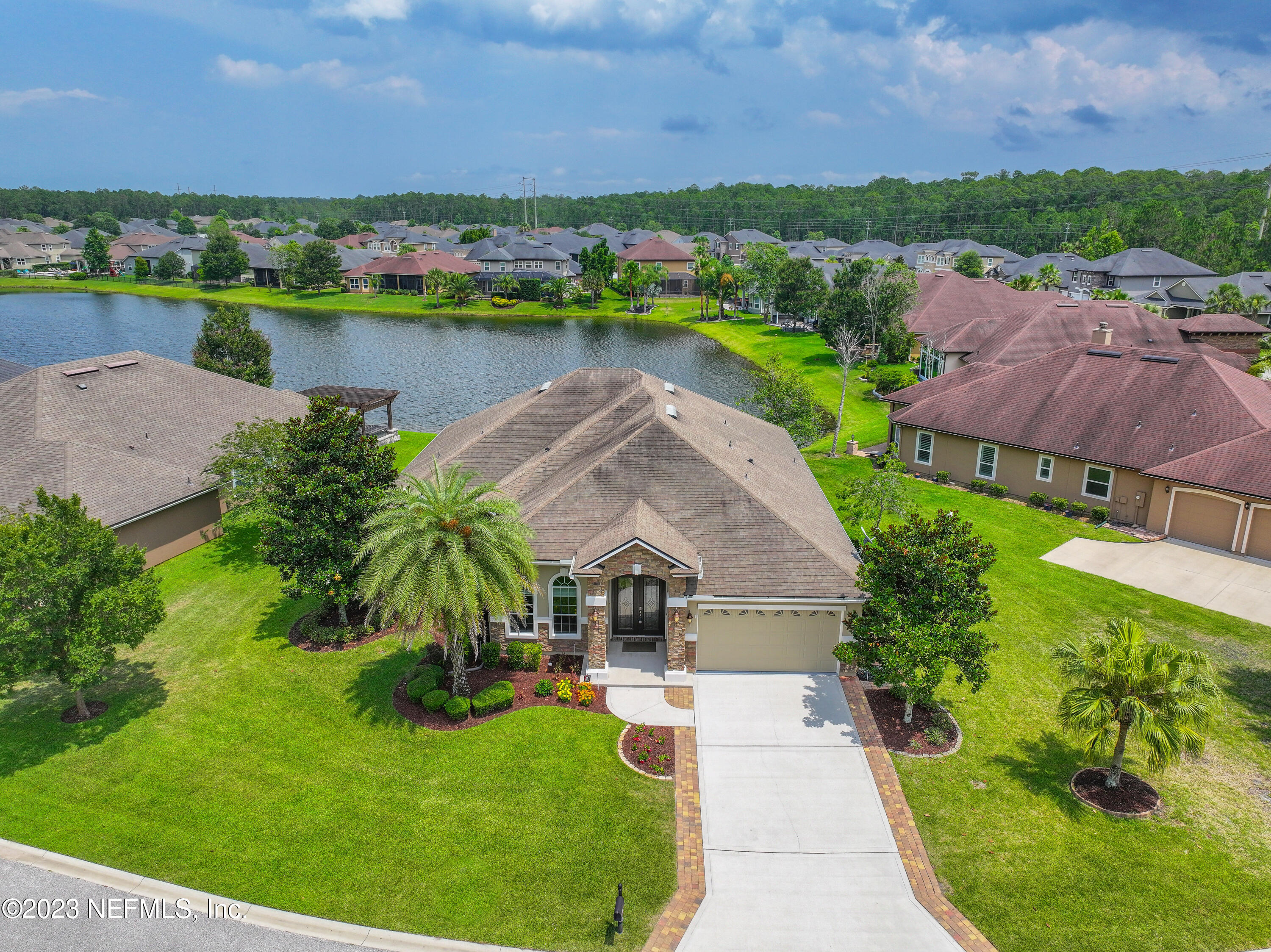 291 Ellsworth Circle St. Johns, FL 32259 - Photo 4 of 72 an aerial view of a house with a garden and lake view