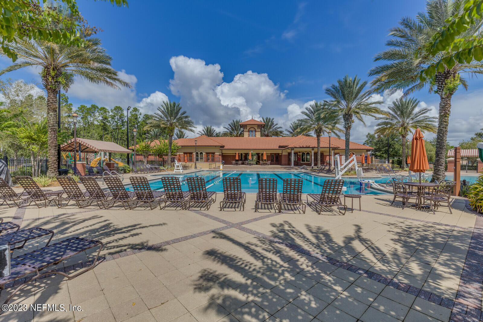 291 Ellsworth Circle St. Johns, FL 32259 - Photo 50 of 72 a view of a street with a yard and palm trees