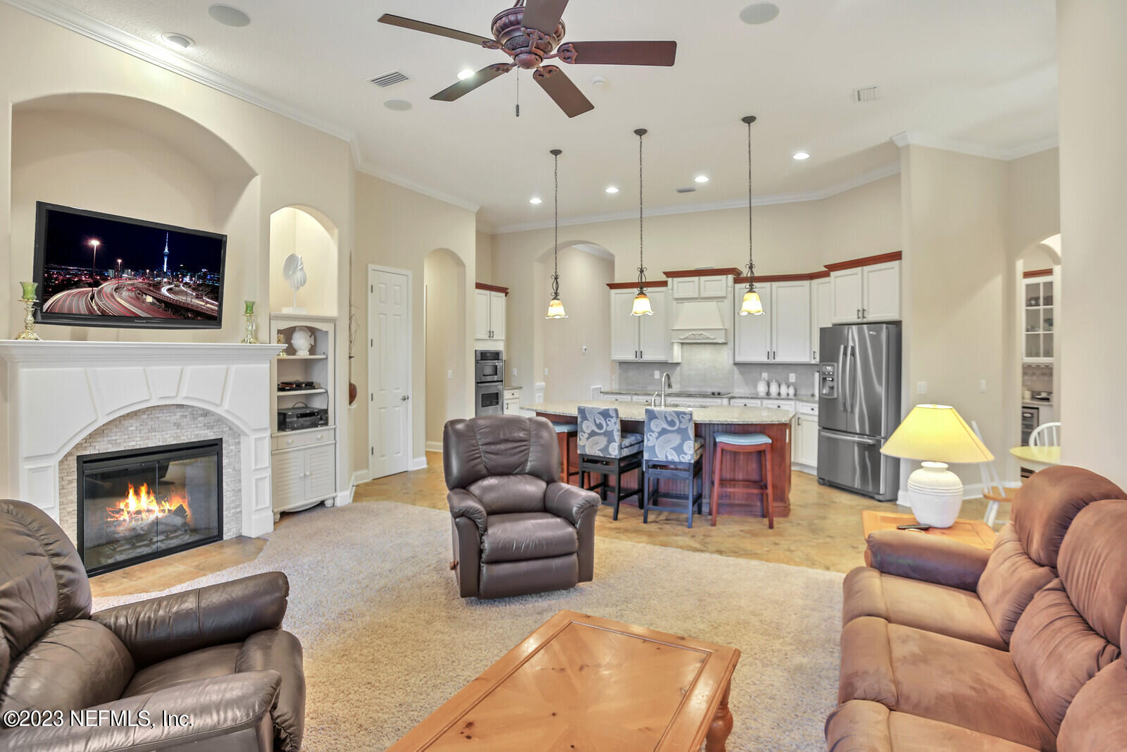 291 Ellsworth Circle St. Johns, FL 32259 - Photo 5 of 72 a living room with furniture and a fireplace