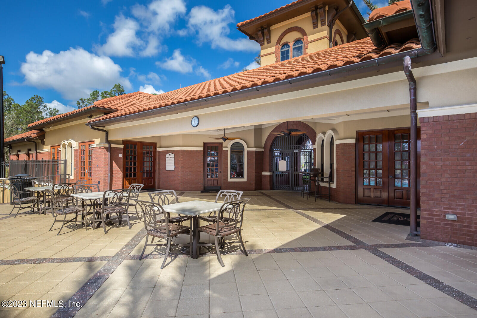 291 Ellsworth Circle St. Johns, FL 32259 - Photo 57 of 72 a view of a patio with table and chairs with wooden floor