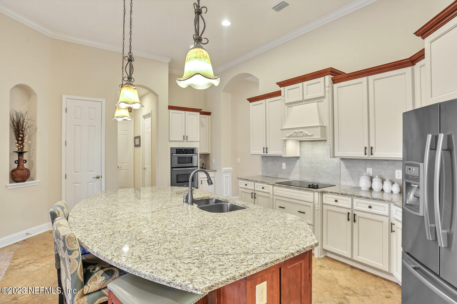 291 Ellsworth Circle St. Johns, FL 32259 - Photo 6 of 72 a kitchen with stainless steel appliances granite countertop a sink a stove and cabinets