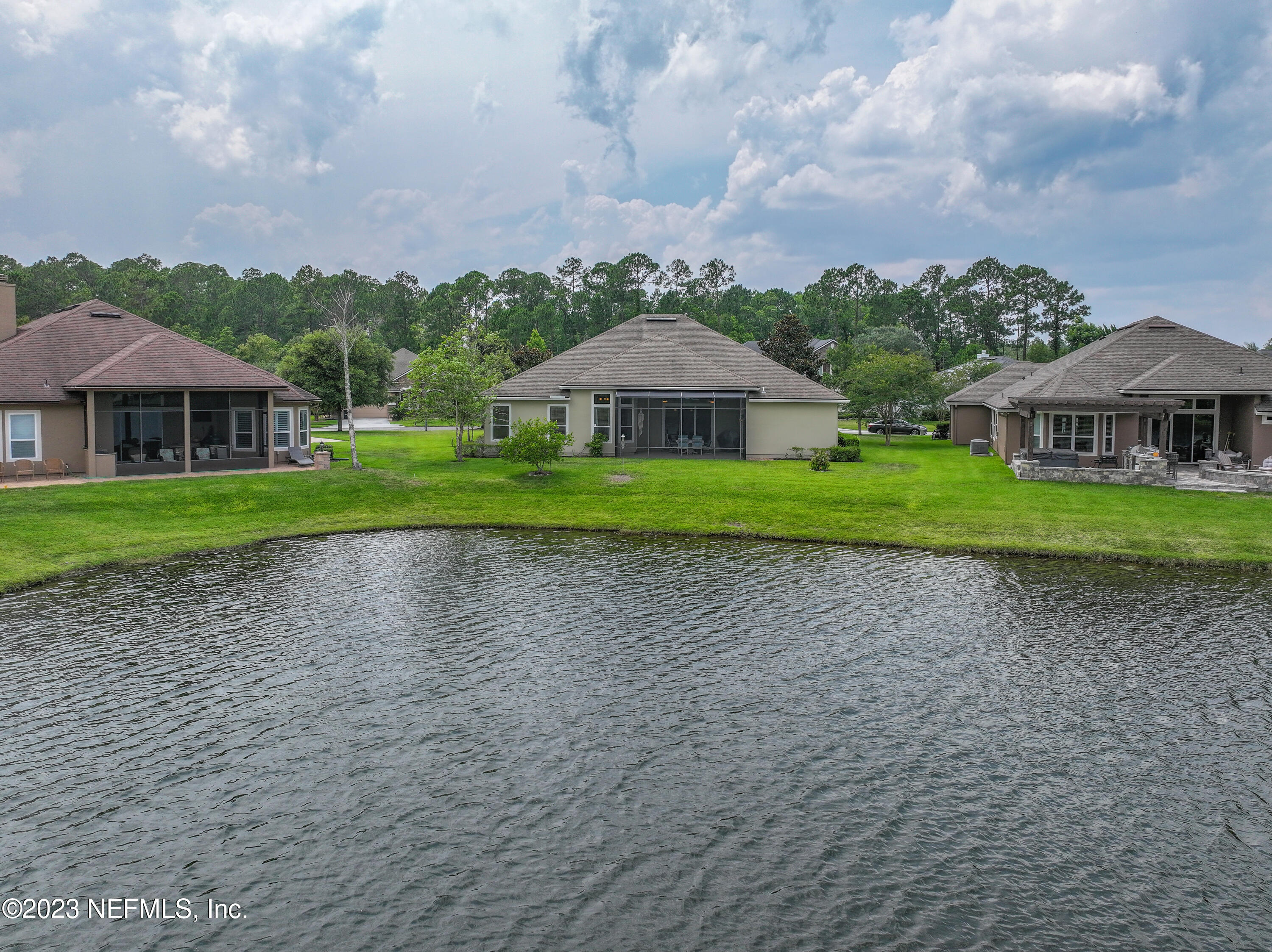 291 Ellsworth Circle St. Johns, FL 32259 - Photo 66 of 72 a view of a big house with a big yard and potted plants