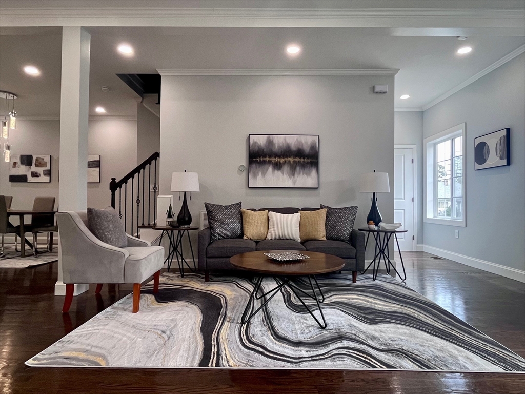 79 Holmes Road Dedham, MA 02026 - Photo 14 of 42 a living room with furniture and a wooden floor
