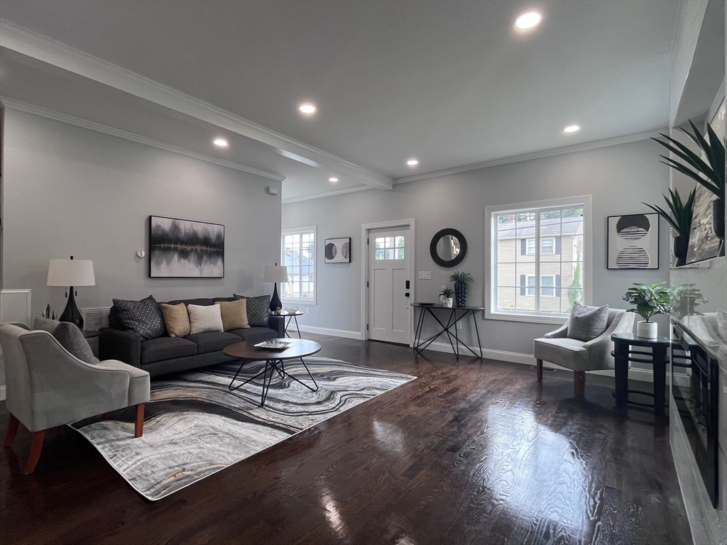 79 Holmes Road Dedham, MA 02026 - Photo 15 of 42 a living room with furniture and wooden floor