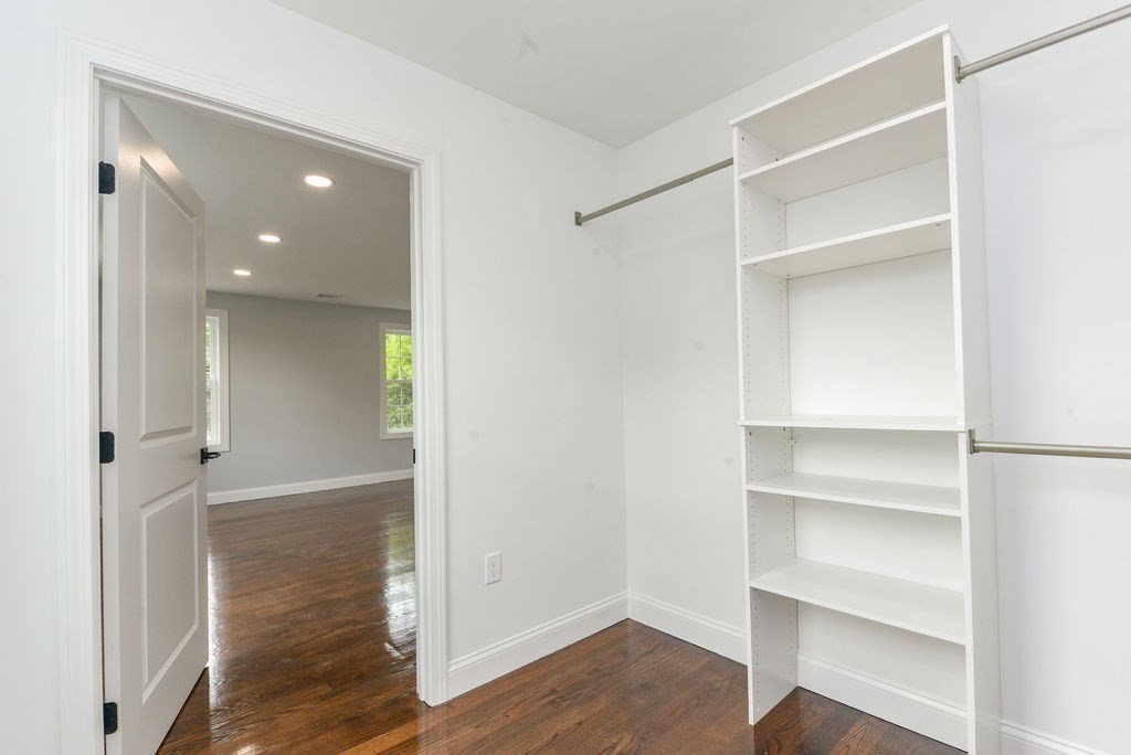 79 Holmes Road Dedham, MA 02026 - Photo 23 of 42 a view of a room with wooden floor