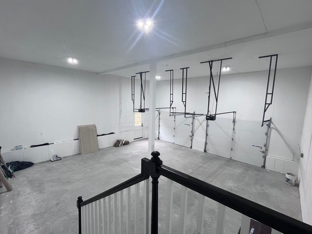 79 Holmes Road Dedham, MA 02026 - Photo 38 of 42 a view of a room with gym equipment