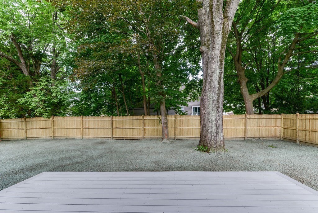 79 Holmes Road Dedham, MA 02026 - Photo 39 of 42 a view of a backyard