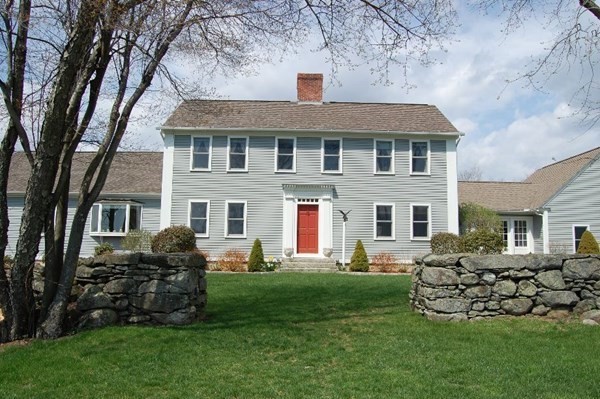 1125 N Road Hardwick, MA 01037 - Photo 1 of 41 a front view of a house with a garden and plants