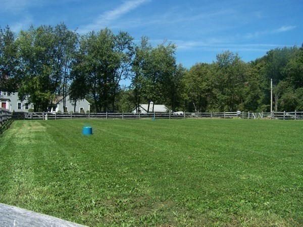 1125 N Road Hardwick, MA 01037 - Photo 17 of 41 a view of a golf course with a lake