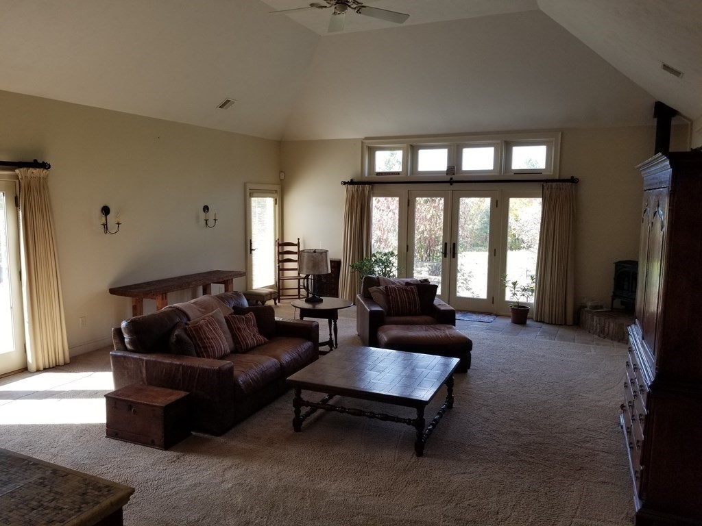 1125 N Road Hardwick, MA 01037 - Photo 25 of 41 a living room with furniture and a large window