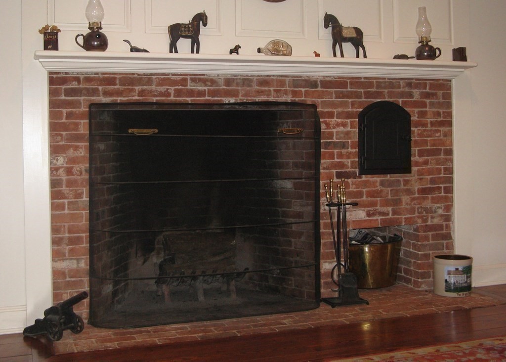 1125 N Road Hardwick, MA 01037 - Photo 27 of 41 a close view of a fireplace with wooden floor