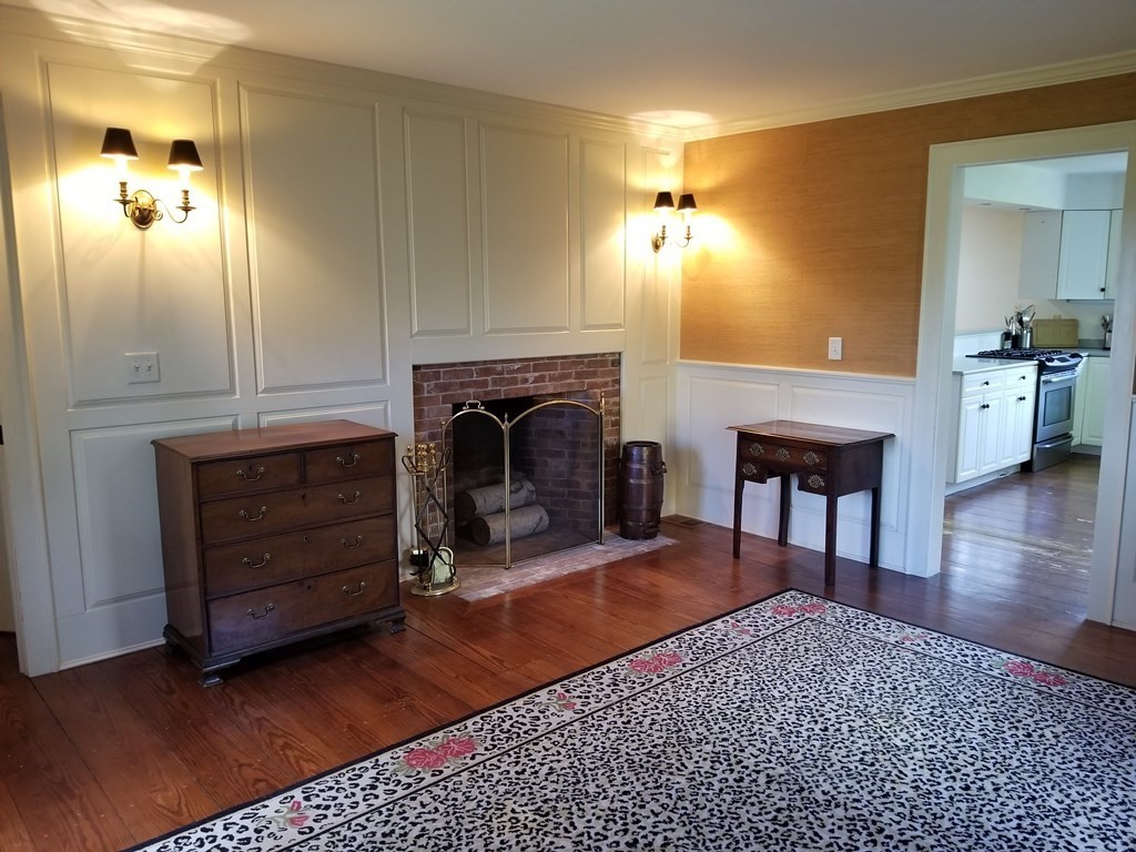 1125 N Road Hardwick, MA 01037 - Photo 29 of 41 a living room with furniture and a fireplace