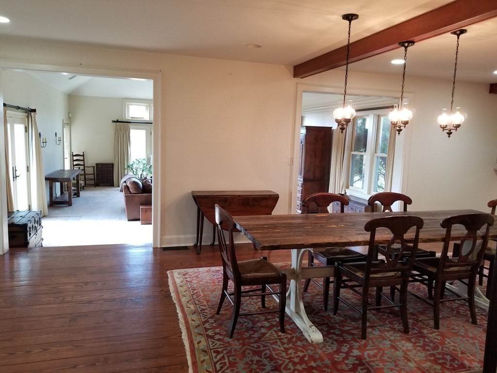 1125 N Road Hardwick, MA 01037 - Photo 30 of 41 a view of a dining room with furniture and wooden floor