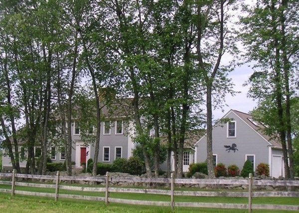 1125 N Road Hardwick, MA 01037 - Photo 3 of 41 a front view of a house with a yard and palm trees