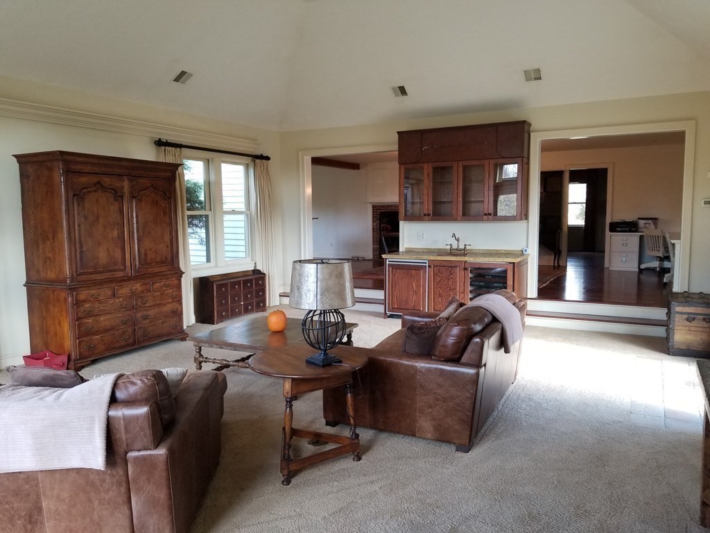 1125 N Road Hardwick, MA 01037 - Photo 31 of 41 a living room with furniture and a fireplace