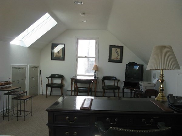 1125 N Road Hardwick, MA 01037 - Photo 35 of 41 a living room with furniture and a lamp