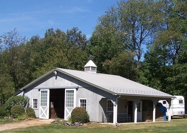 1125 N Road Hardwick, MA 01037 - Photo 8 of 41 a front view of a house with a yard