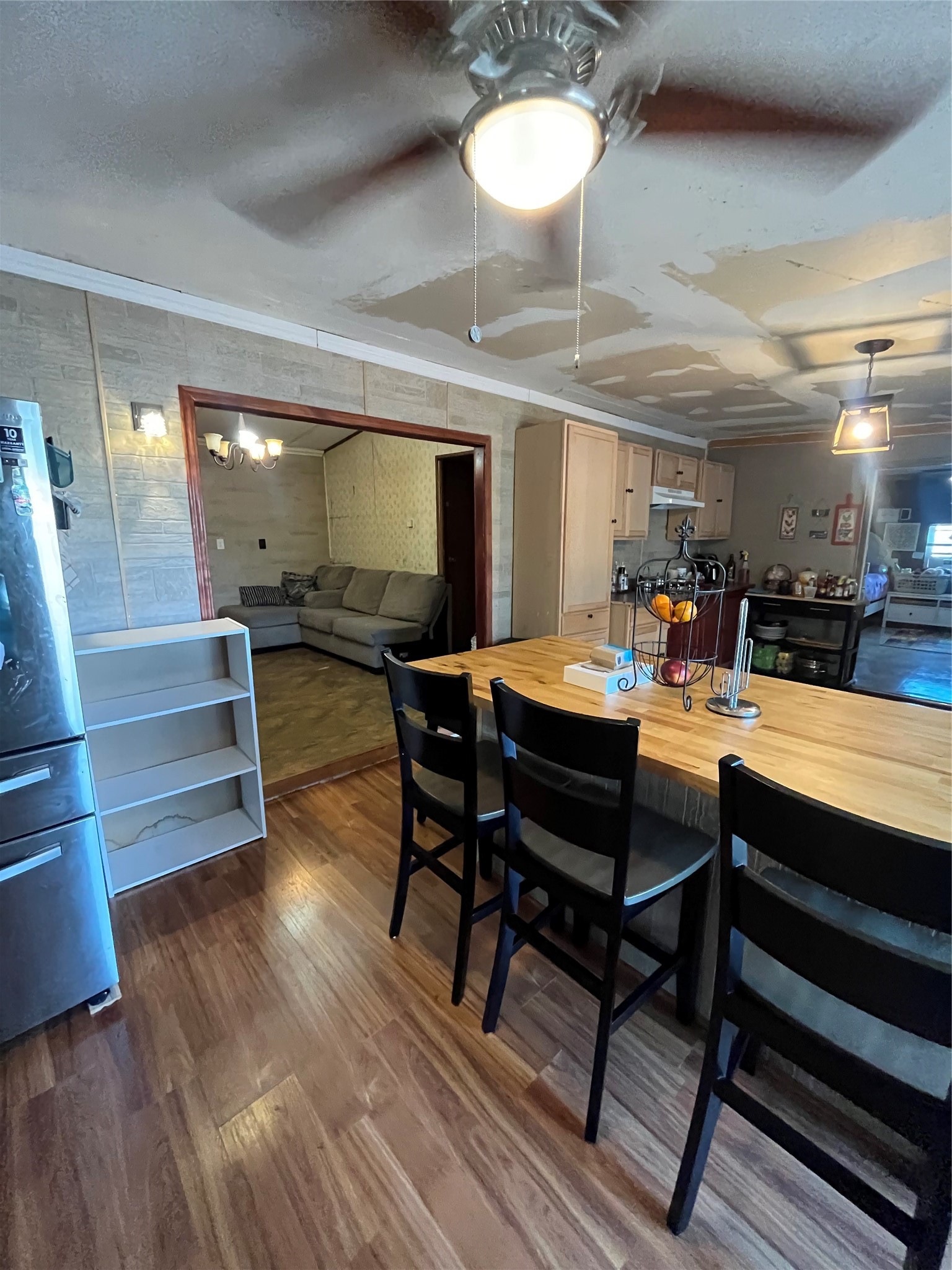 8026 Forest Trace Conroe, TX 77306 - Photo 8 of 28 a view of a dining room with furniture and wooden floor