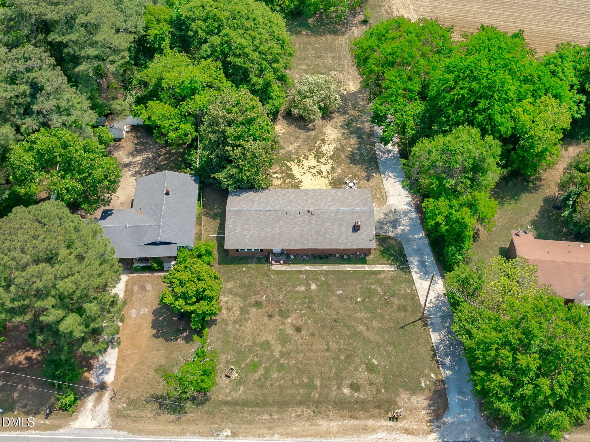 995 Shawtown Road Lillington, NC 27546 - Photo 24 of 27 Aerial view from front. Note long paved driveway for multiple vehicles.