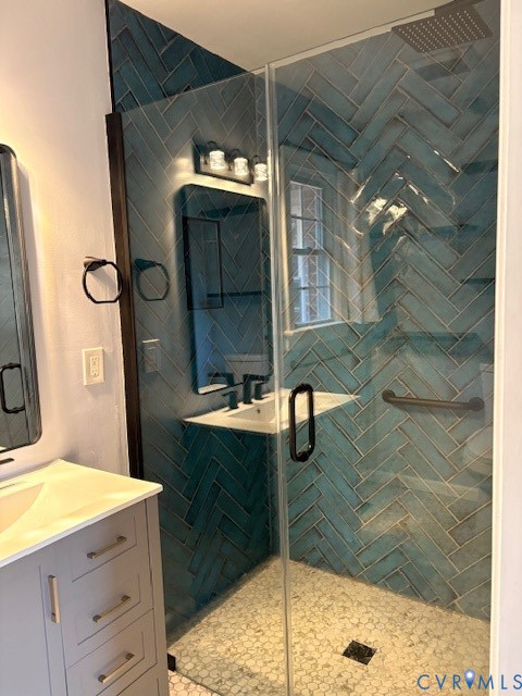 16487 Mountain Road Montpelier, VA 23192 - Photo 14 of 16 a bathroom with a sink and mirror
