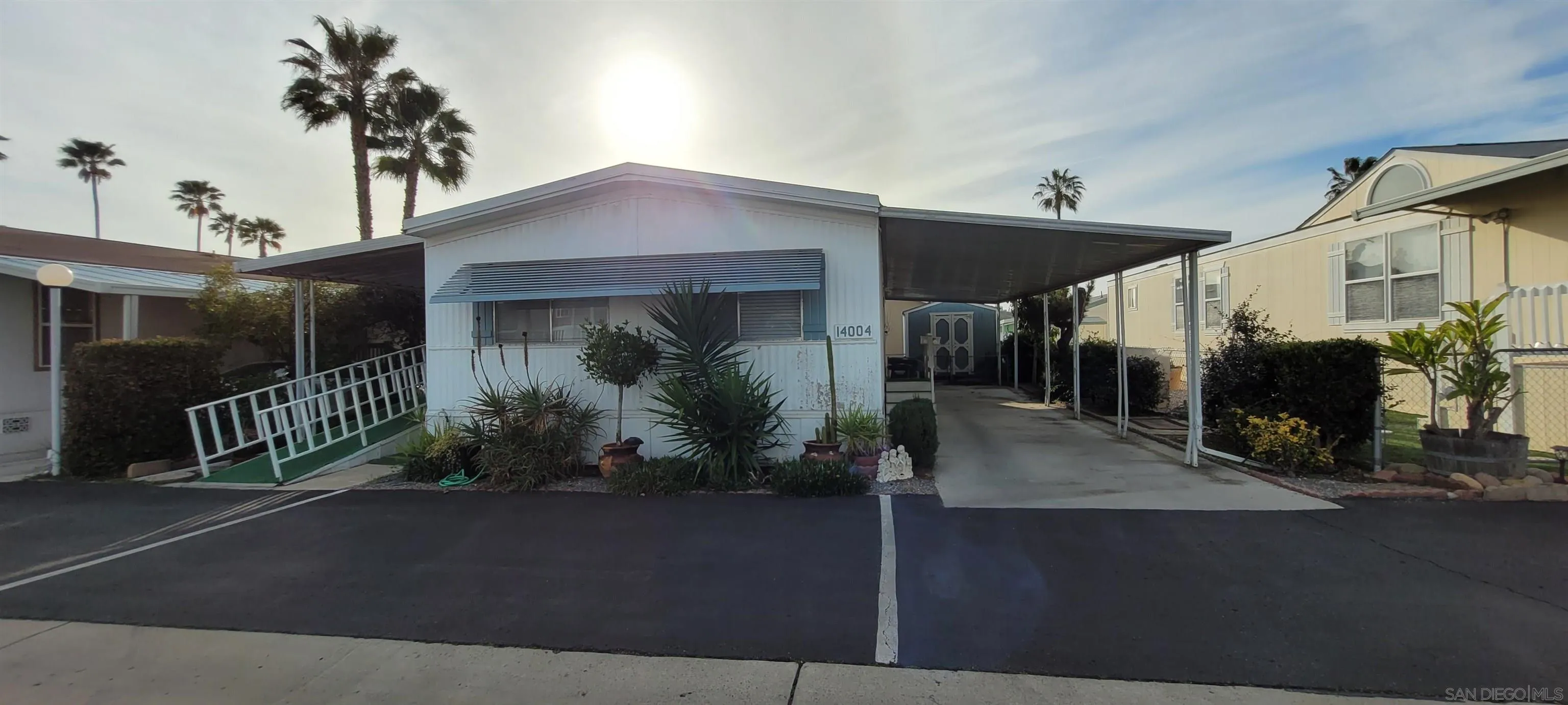 14004 Jasmine Avenue, Unit 260 Poway, CA 92064 - Photo 2 of 6 a view of a house with street